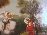 a painting on the wall of a church depicting an angel and a child