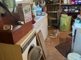 a washer and dryer in a room that is being remodeled
