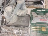 a pile of assorted electrical equipment on the floor