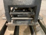 a machine that is sitting on top of a pallet