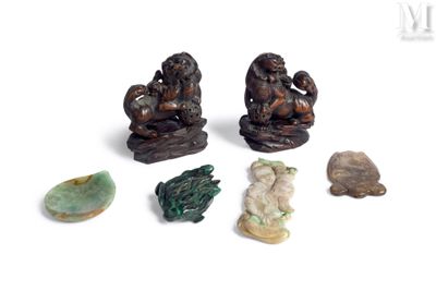 a lot of small figurines that are sitting on a table