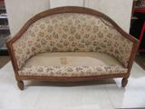 a couch that is sitting on a table in a room