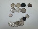 a smiley face made out of coins on a table