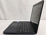 an open laptop computer sitting on top of a white surface