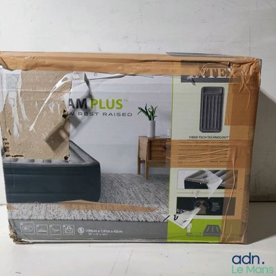 une image représentant une boîte dans laquelle figure l'image d'un lit