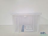 a clear plastic box with a magazine inside of it