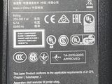 a close up of the back of a laptop charger