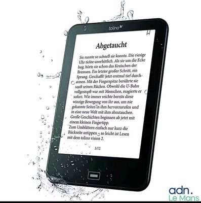 an image of a kindle with water splashing on the screen