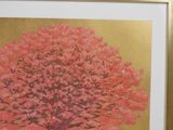 a picture of a painting of a tree in a gold frame