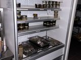 a refrigerator that has some food in it