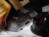 a bag of food sitting on a table next to a coffee maker