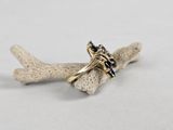 a close up of a ring on a piece of coral