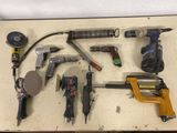 a lot of tools that are laying out on the table