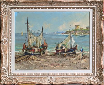 two boats that are sitting on the beach