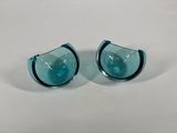 pair of blue glass earrings on a white surface