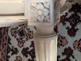 the legs of a chair are painted white and the top of the chair is painted white