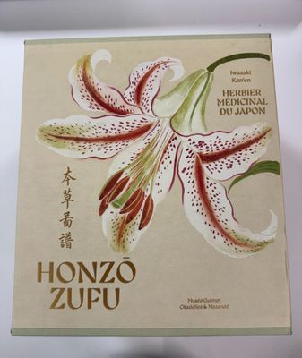 a picture of a book with a picture of a flower on it