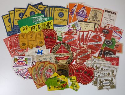many different types of stickers and labels on a white surface