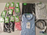 many different types of shirts and ties on the table