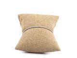 a close up of a pillow on a white background