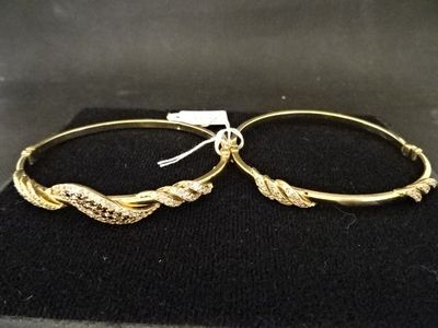 Deux bracelets en or 750‰ et pierres. - Photo 1