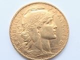 an image of a gold coin with a woman ' s head on it