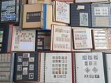 many different types of stamps on the pages of a book