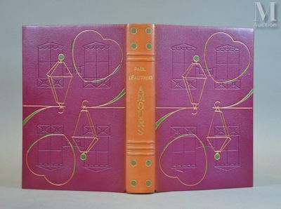 a pink book with a picture of a man on a bike