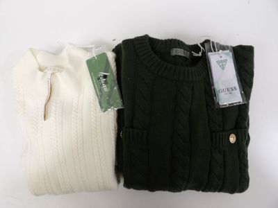 two pairs of sweaters sitting next to each other on a white surface