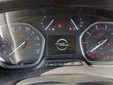 a close up of a car dashboard with a speedometer and gauges