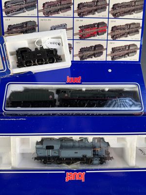 a box with a train set inside of it