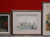 three framed pictures on the wall next to each other