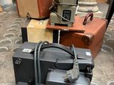 many pieces of luggage sitting on the floor next to each other