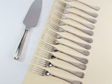 a lot of forks and a knife on the table