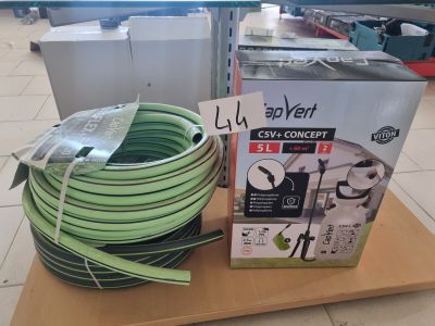 a box with a green hose and a box with a green hose