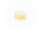 a yellow oplite gems on a white background