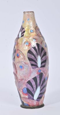 a vase with a design on it on a white surface