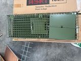 a box that has a cage on top of it
