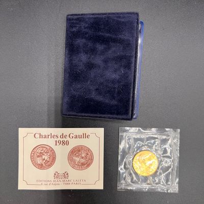 une image représentant un livre bleu contenant une pièce d'or