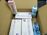 a box of books and a bottle of water in it