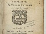an old book with a black and white image of a seal on it