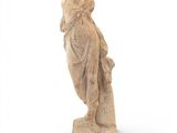 an old statue of a woman holding a bird on a white background
