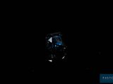 a close up of a blue diamond on a black background