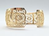 gold filigree cuff bracelet with filigreed filigree design