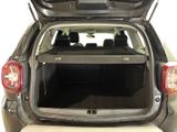 the back end of a car with the trunk open and luggage in the trunk
