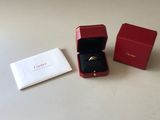 a close up of a box with a ring inside of it