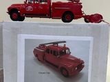 a picture of a red fire truck on top of a box
