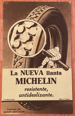une publicité pour les pneus Michel sur le mur d'un immeuble