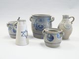 four vases and a vase with a star of david on them
