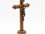 wooden cross with crucift on it on a white background